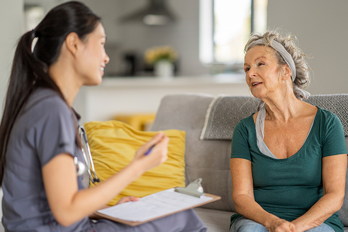 Woman with nurse-clipboard Woman with nurse-clipboard